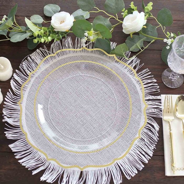 Elegant glass plate with gold trim and fringe detail, styled with floral decor.