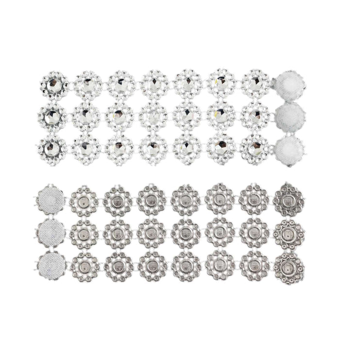 Silver and crystal embellishments arranged in a decorative pattern
