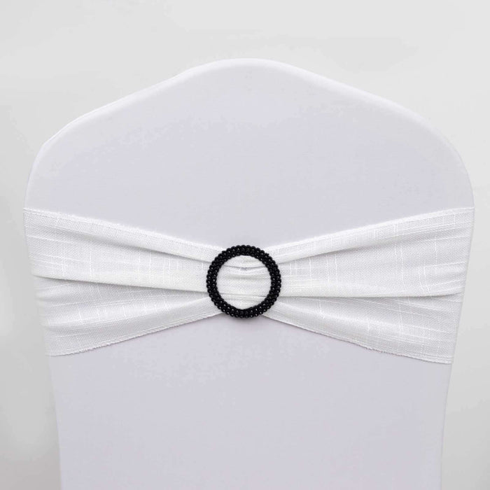 White chair cover with black beaded ring detail