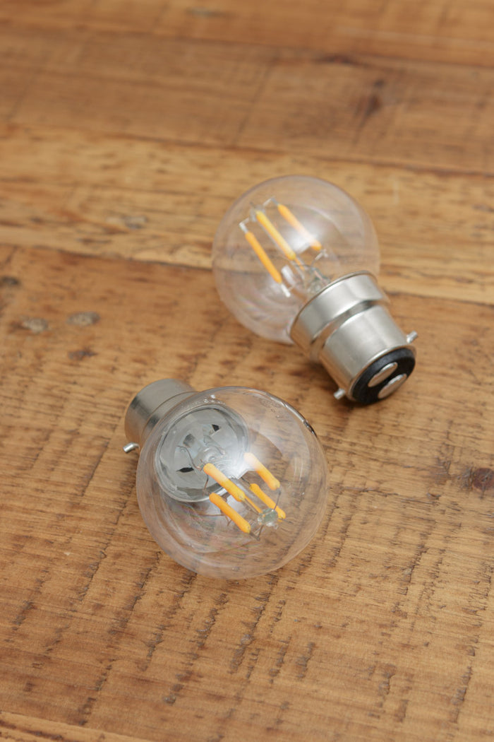 B22 B081 clear 24V G45 bulbs on a timber bunch