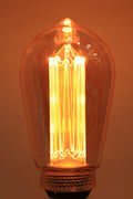 Laser-cut filament amber teardrop LED bulb