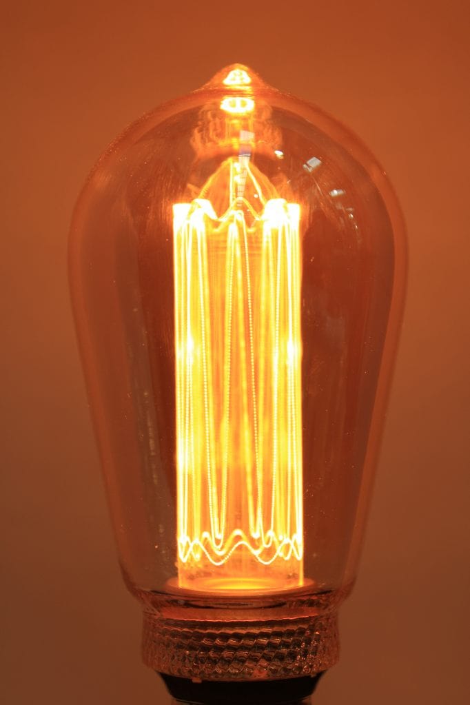 Laser-cut filament amber teardrop LED bulb