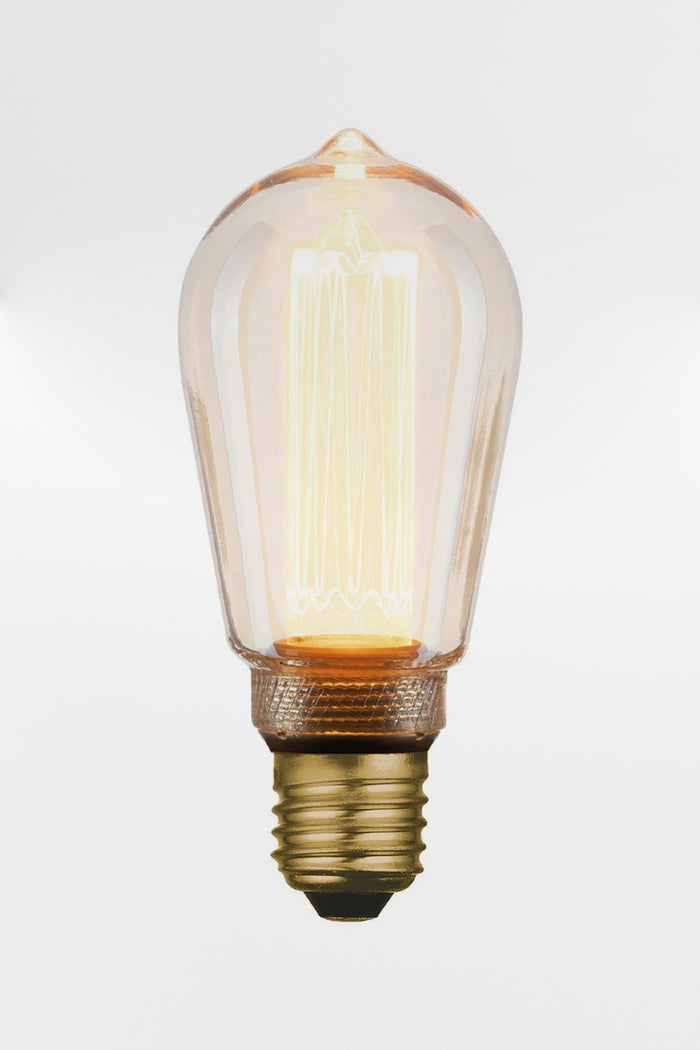 Laser-cut filament amber teardrop LED bulb with E27 base.