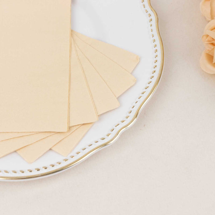 Beige textured paper sheets arranged on an elegant plate.