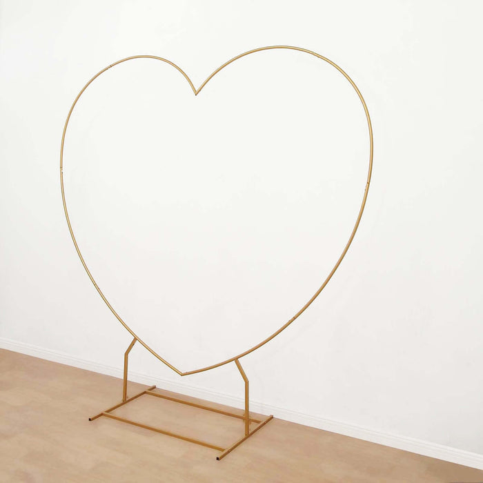 Gold heart-shaped arch backdrop for events and photography