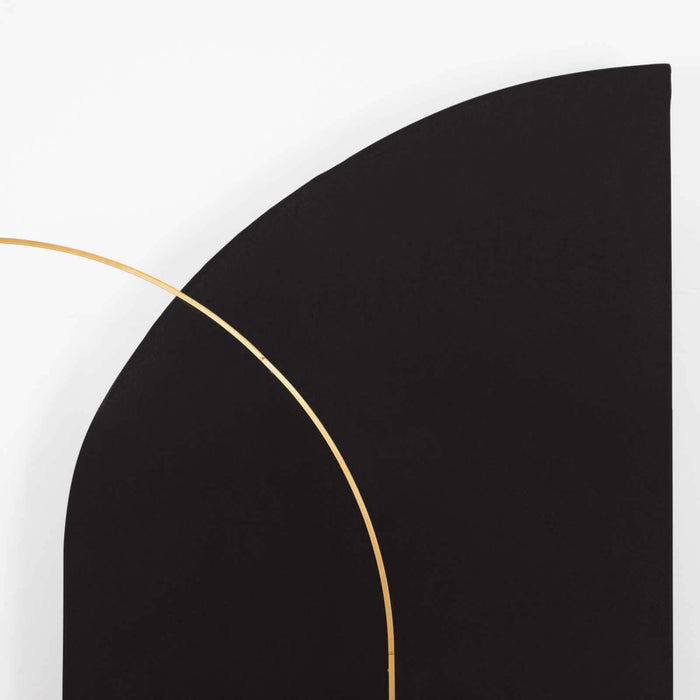 Black wall art with a gold arc accent on a white background