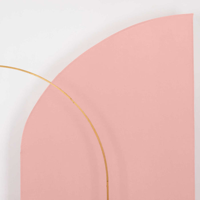 Curved pink backdrop with gold arch detail