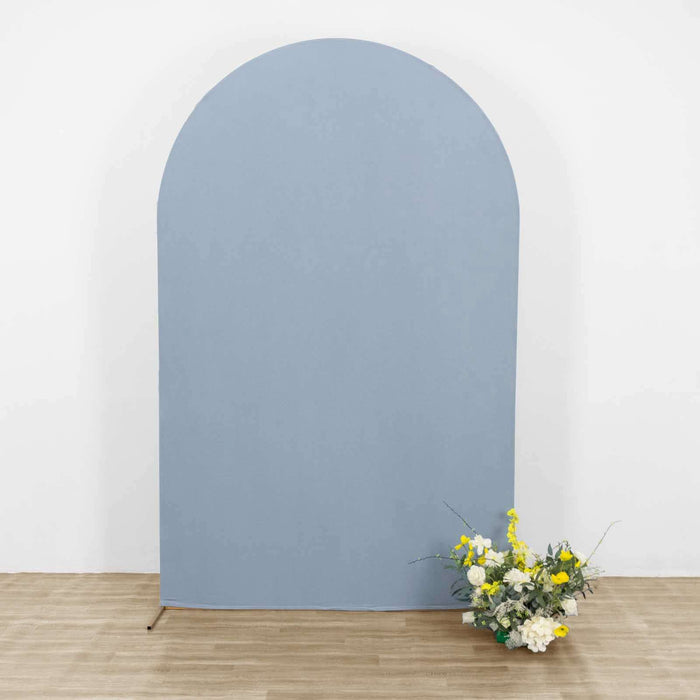 Blue arch backdrop with floral arrangement at the base