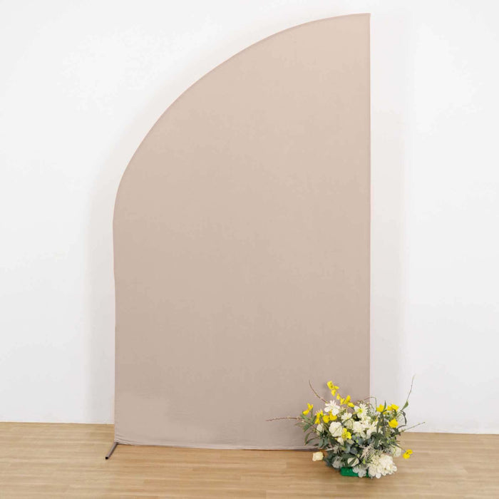 Neutral backdrop with floral arrangement in front