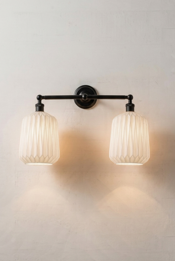 Arcadia Glass Double Wall Light in black with two Art Deco inspired opal geometric glass shades.