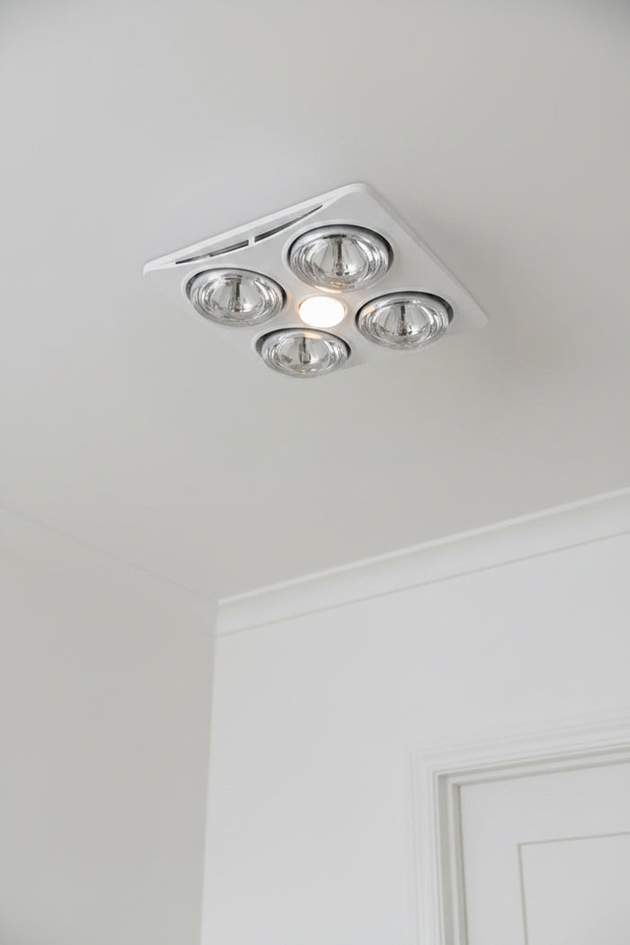 Measurements of the Ardene QUATTRO 3-in-1 Bathroom Heater with Exhaust Fan and Light in a white bathroom ceiling.