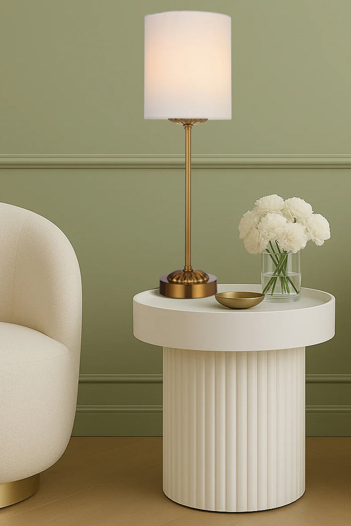 Antique gold table lamp stand with ivory fabric shade as a side table lamp.
