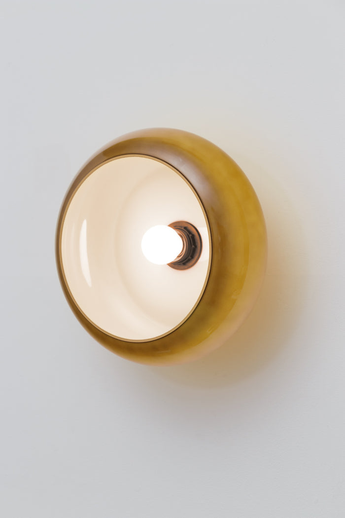 The handmade blown glass shade in sage