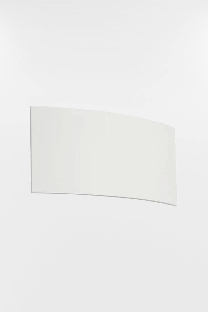 Unpainted white plaster wall light shown on a white wall, highlighting the paintable surface for custom colour matching.