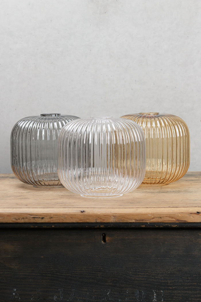 Three finishes of the reeded glass shade.