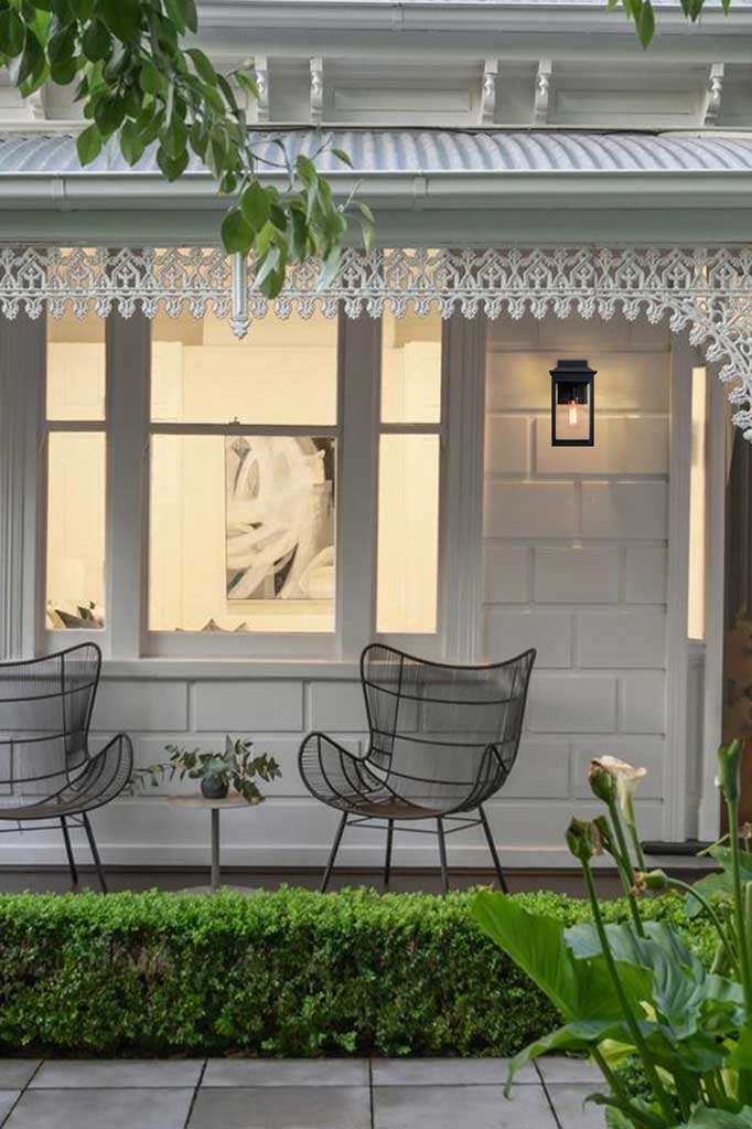 Barrowgate Exterior Wall Lantern installed on a white brick heritage home.