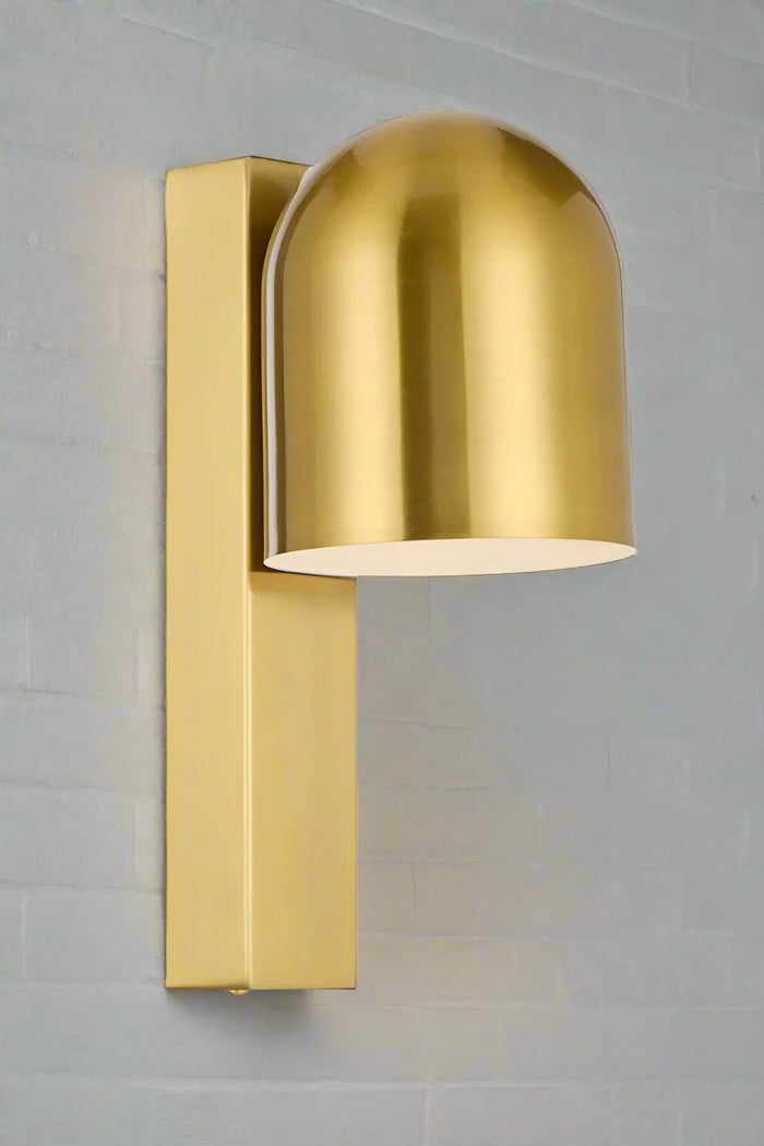 Antique gold touch wall light with swival shade.