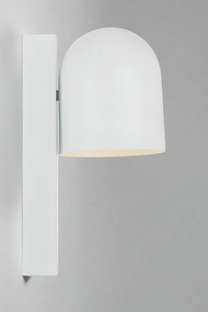 Side view of a white touch wall light with swival shade.