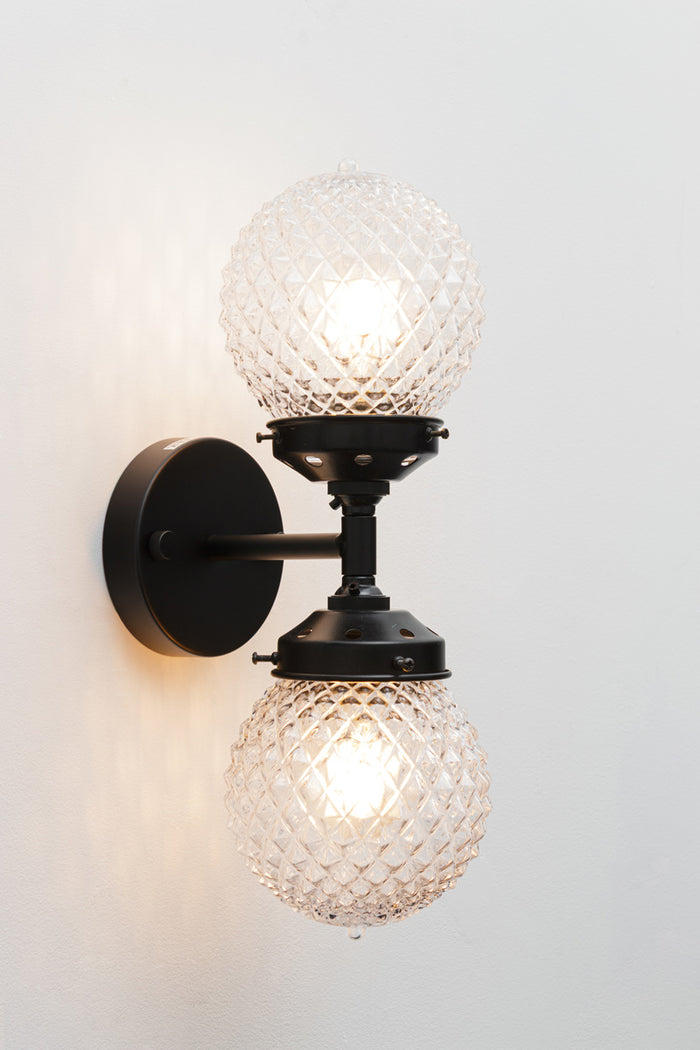 Belvoir Glass Double Light Wall Sconce with two vintage style glass shades.