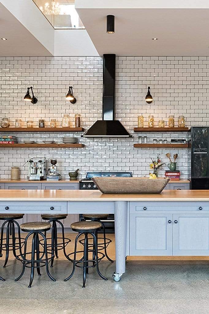 Industrial arm wall light. industrial chic kitchen design.