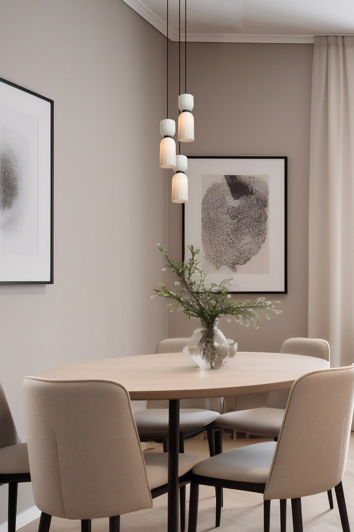 Opal please glass pendants over dining tabel