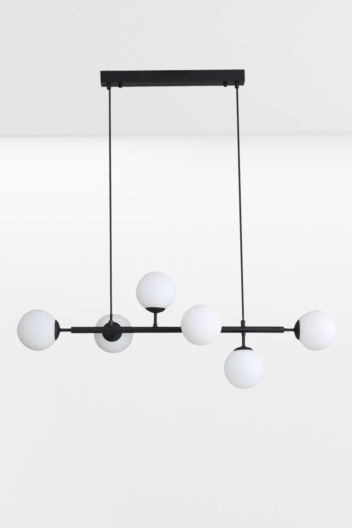 Black 6 light linear glass ball pendant light.