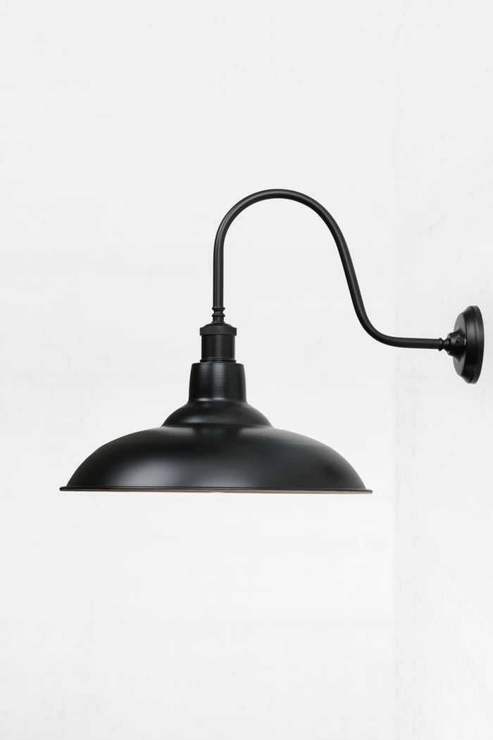 Side view of the Black metal shade with an extra large gooseneck outdoor wall sconce.