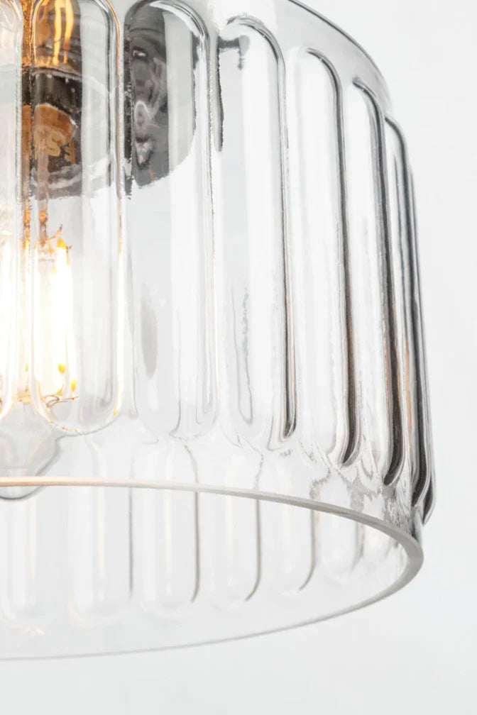 Its distinctive pattern protrudes outwards from the inside of the shade, creating a unique effect.