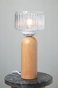 Capri Wood Table Lamp with clear vertically fluted glass shade and natural timber base