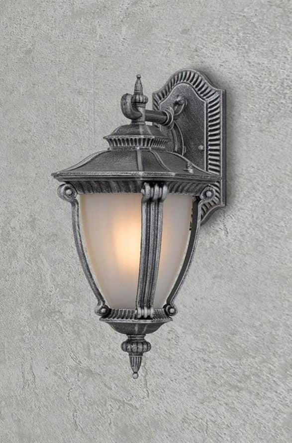 Outdoor wall light in antique silver finish.
