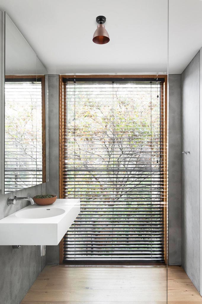 Copper shade on an IP rated batten holder in a bathroom.