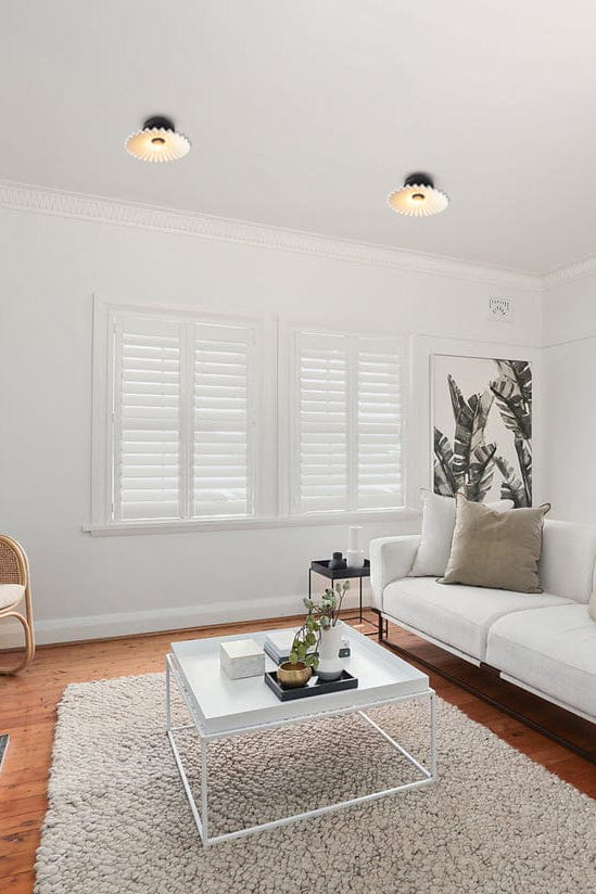 Ceramic flush mounts in a living room