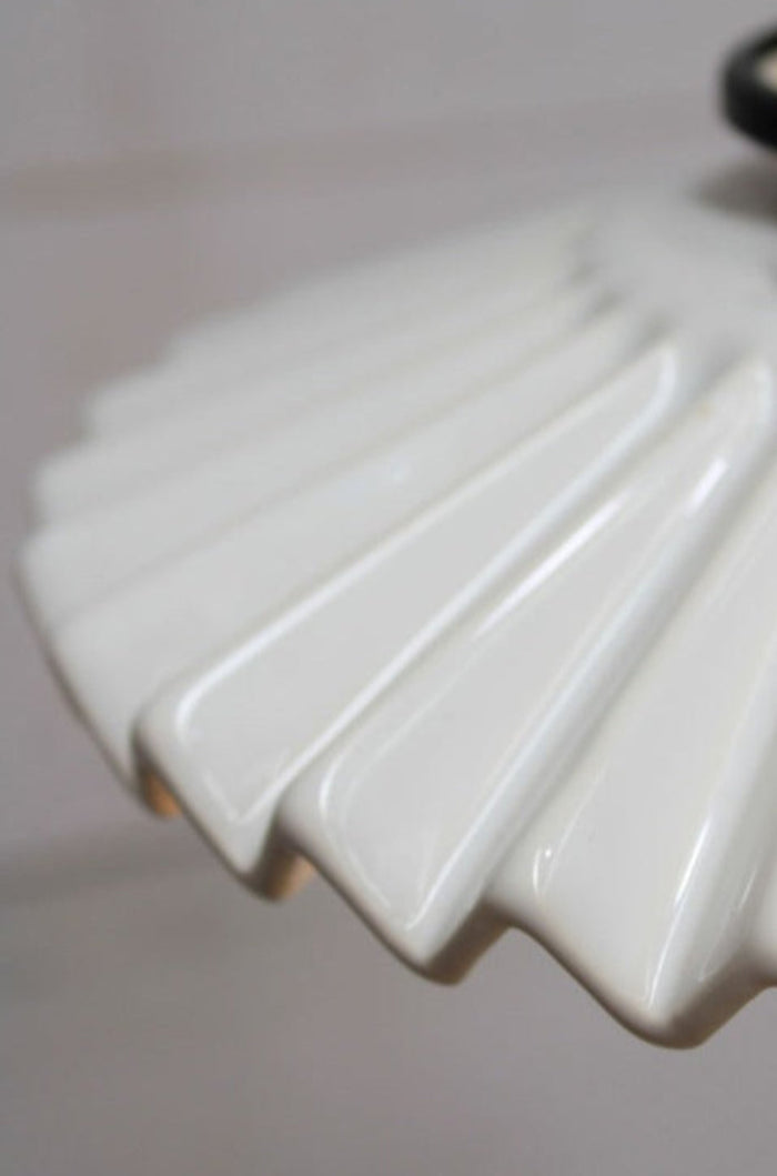 skilfully made from ceramic with pleat design