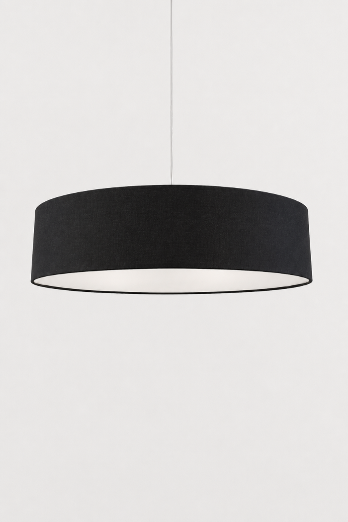 Clemente black fabric drum pendant light with a modern cylindrical shade and black fabric suspension cord.