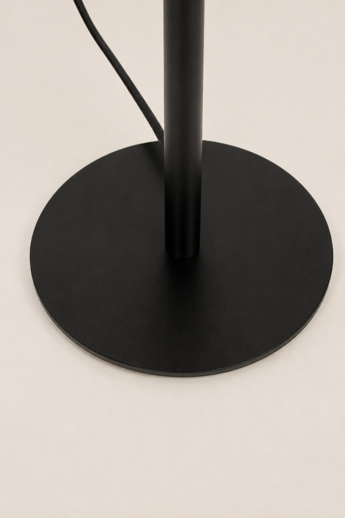 Close up of the base of the black Collies desk lamp.