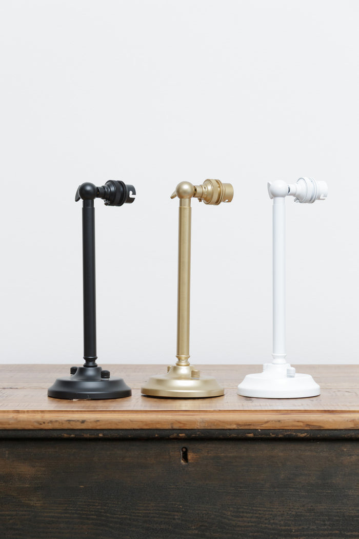 Long straight arm wall sconce in three finishes