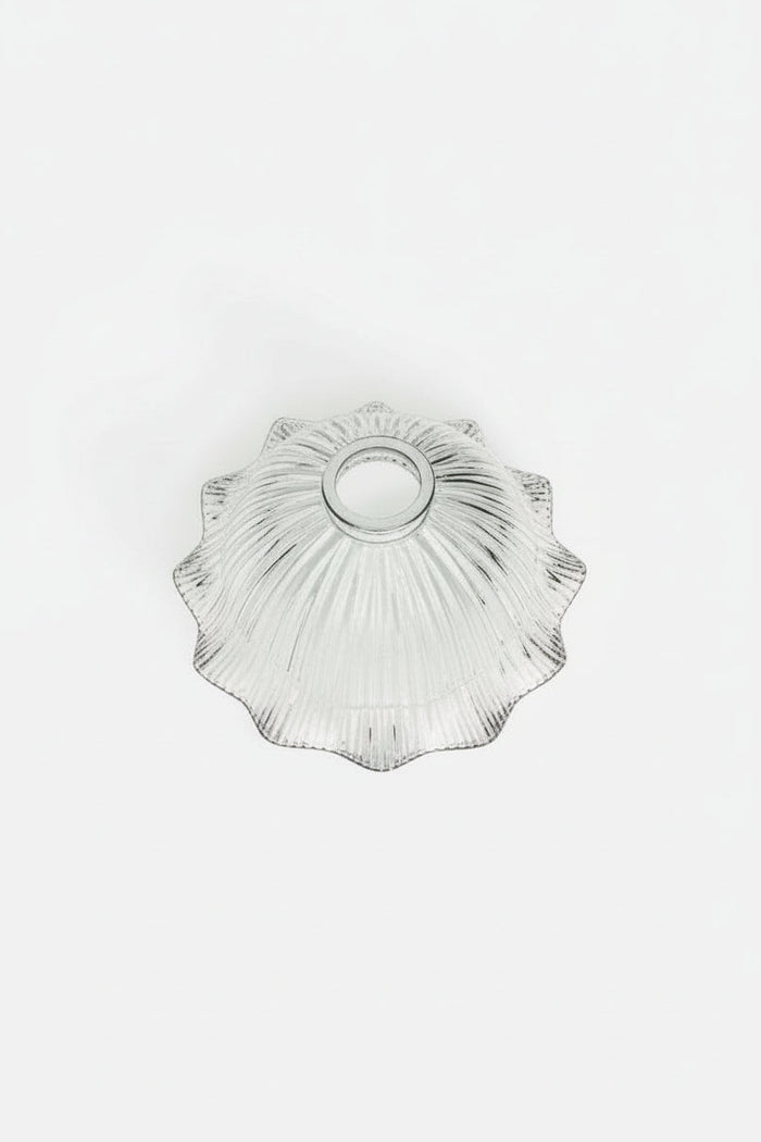 Top view of the Holophane clear glass shades in a large size with a frilled edge.