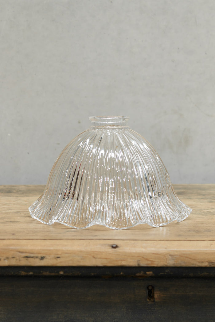 Holophane clear glass shade in a large size with a frilled edge.