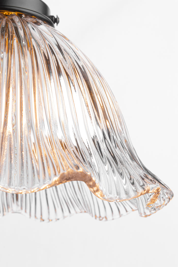 Close up of the frill edged of the clear shade with ribbed detailing.
