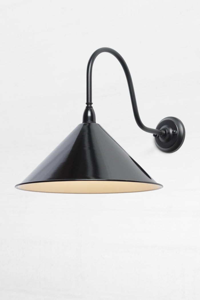 Large Black Cone shade on an outdoor extra large goosencek wall sconce in black.