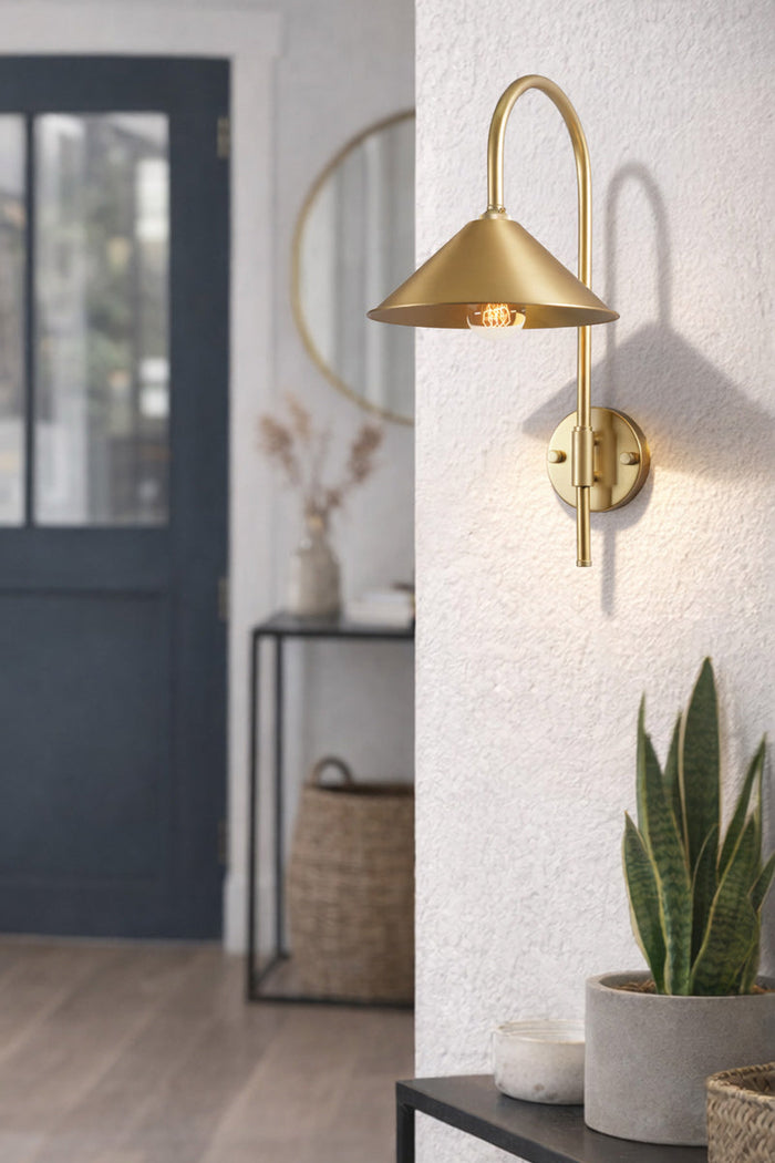 Gold/brass shepherds hook wall sconce with solid brass cone shade as an entry table light
