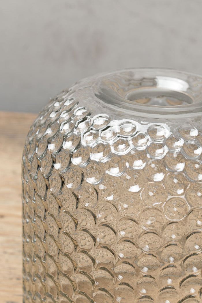 Close up of dimpled clear glass shade detailing.