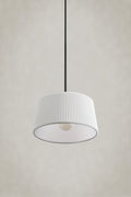 small white Pleat Penant light on black cord.