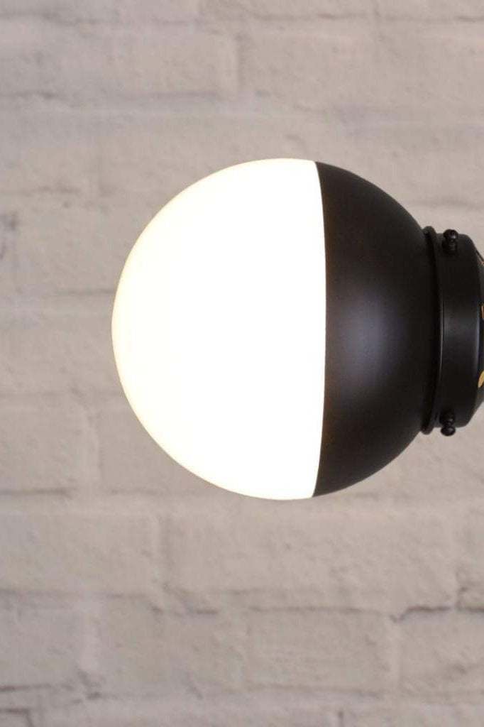 Black opal glass wall light