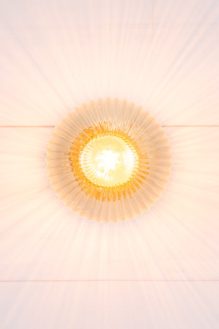 amber glass reeded shade with gold batten holder