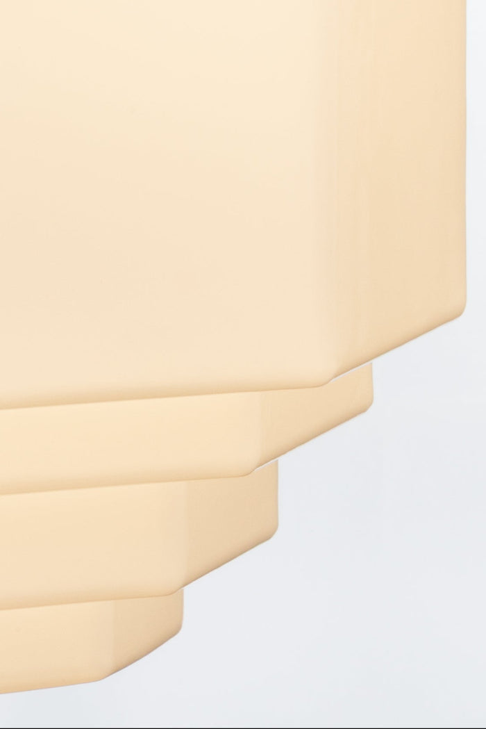 Opal glass shade has an elegant three-tiered cascading detailing and bold silhouette