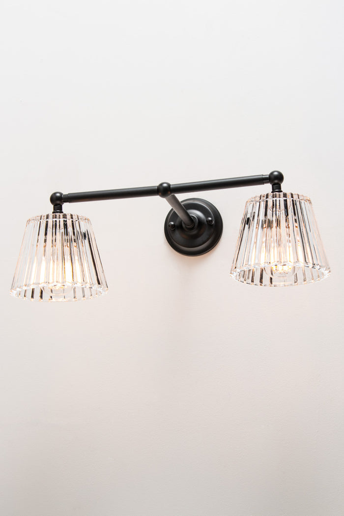 Black steel Davis Glass Double Swivel Arm Wall Light with two clear fluted glass shades