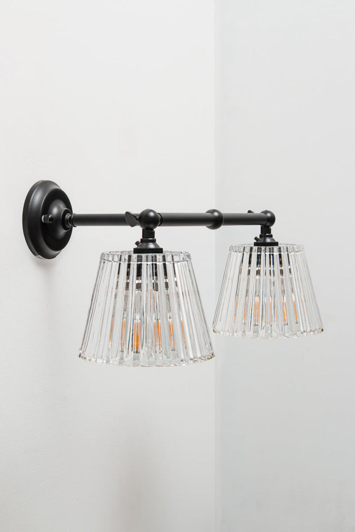 Black Davis Glass Double Swivel Arm Wall Light with two clear fluted glass shades