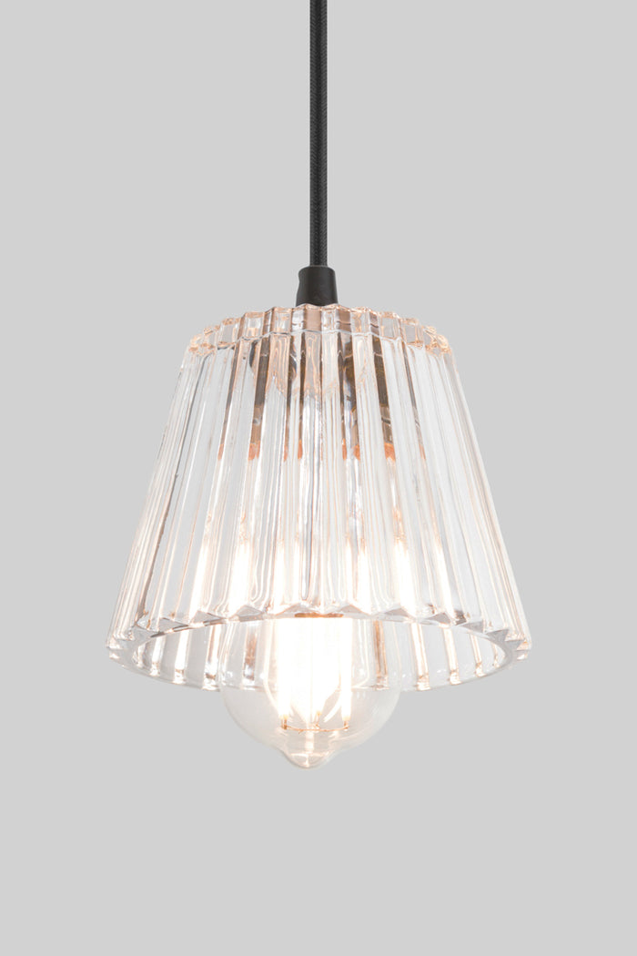 Davis Glass Pendant Light clear fluted glass shade with a tapered silhouette catches and refracts light