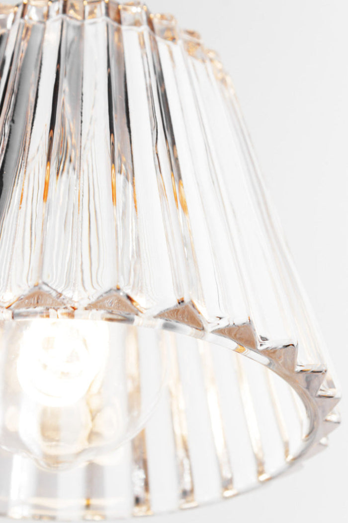 Close up of the scalloped detailed edge of the avis glass shade.